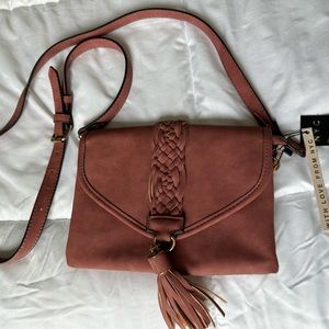 Rose colored leather crossbody purse